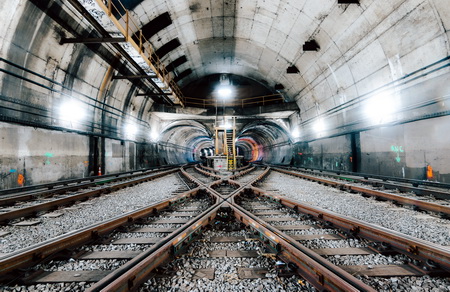 NYC subway tunnel with tracks crossing