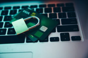 Computer keyboard with credit cards and lock on top
